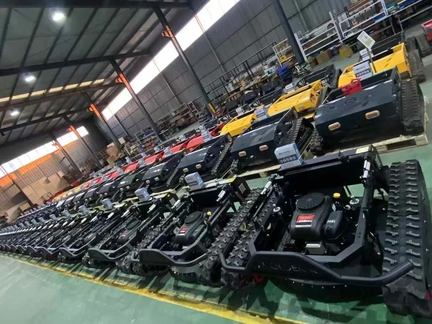 Remote-controlled mowers being assembled in rows at the Raymon production workshop in Luoyang